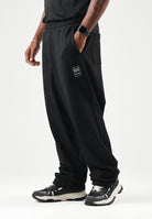 EA7 Pantaloni sportivi neri per uomo con vita elasticizzata e patch logo. 7M002111AF27201 UC001 EA7 