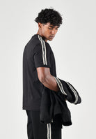 EA7 T-shirt manica corta nera per uomo con bande logate sulle maniche. 7M002189AF10373 UC001 EA7 