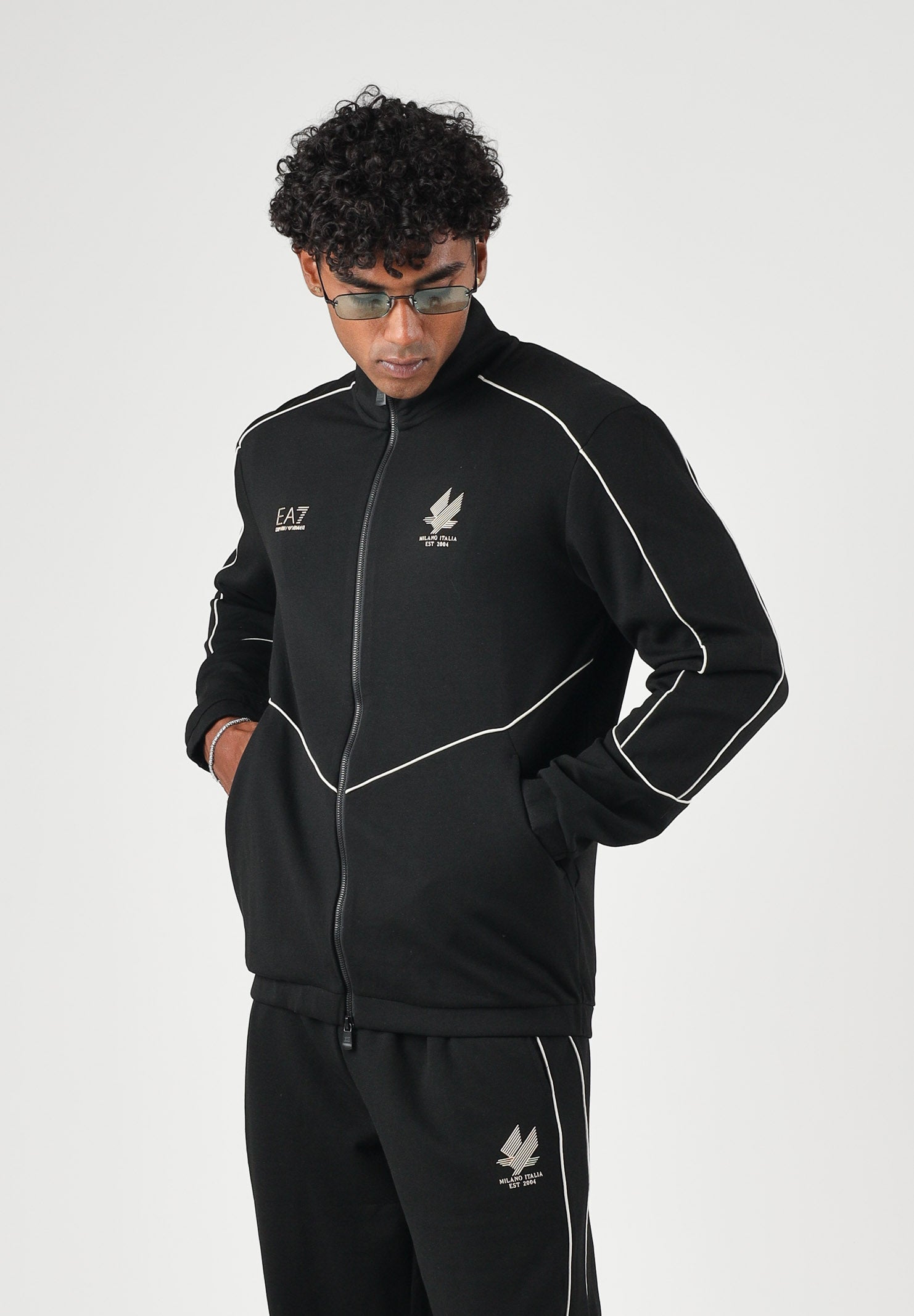 EA7 Tuta sportiva neri per uomo con piping a contrasto, giacca con zip e pantaloni jogger. 7M002259AF21491 UC001 EA7 