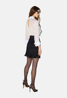 ELISABETTA FRANCHI Abito corto avorio-nero per donna con corpetto stampato e gonna corta con frange. AB02267E2 309 ELISABETTA FRANCHI 