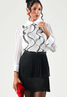 ELISABETTA FRANCHI Abito corto avorio-nero per donna con corpetto stampato e gonna corta con frange. AB02267E2 309 ELISABETTA FRANCHI 