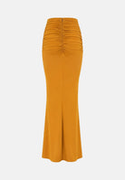 ELISABETTA FRANCHI Gonna in jersey ambra-giallo ocra da donna con drappeggi e spacco anteriore. GO25167E2 940 ELISABETTA FRANCHI 