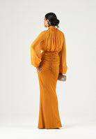 ELISABETTA FRANCHI Gonna in jersey ambra-giallo ocra da donna con drappeggi e spacco anteriore. GO25167E2 940 ELISABETTA FRANCHI 