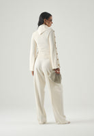 ELISABETTA FRANCHI Maglia con collo asimmetrico, color burro-crema da donna con bottoni gioiello dorati<BR/> MK03S66E2 193 ELISABETTA FRANCHI 