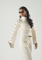ELISABETTA FRANCHI Maglia con collo asimmetrico, color burro-crema da donna con bottoni gioiello dorati<BR/> MK03S66E2 193 ELISABETTA FRANCHI 