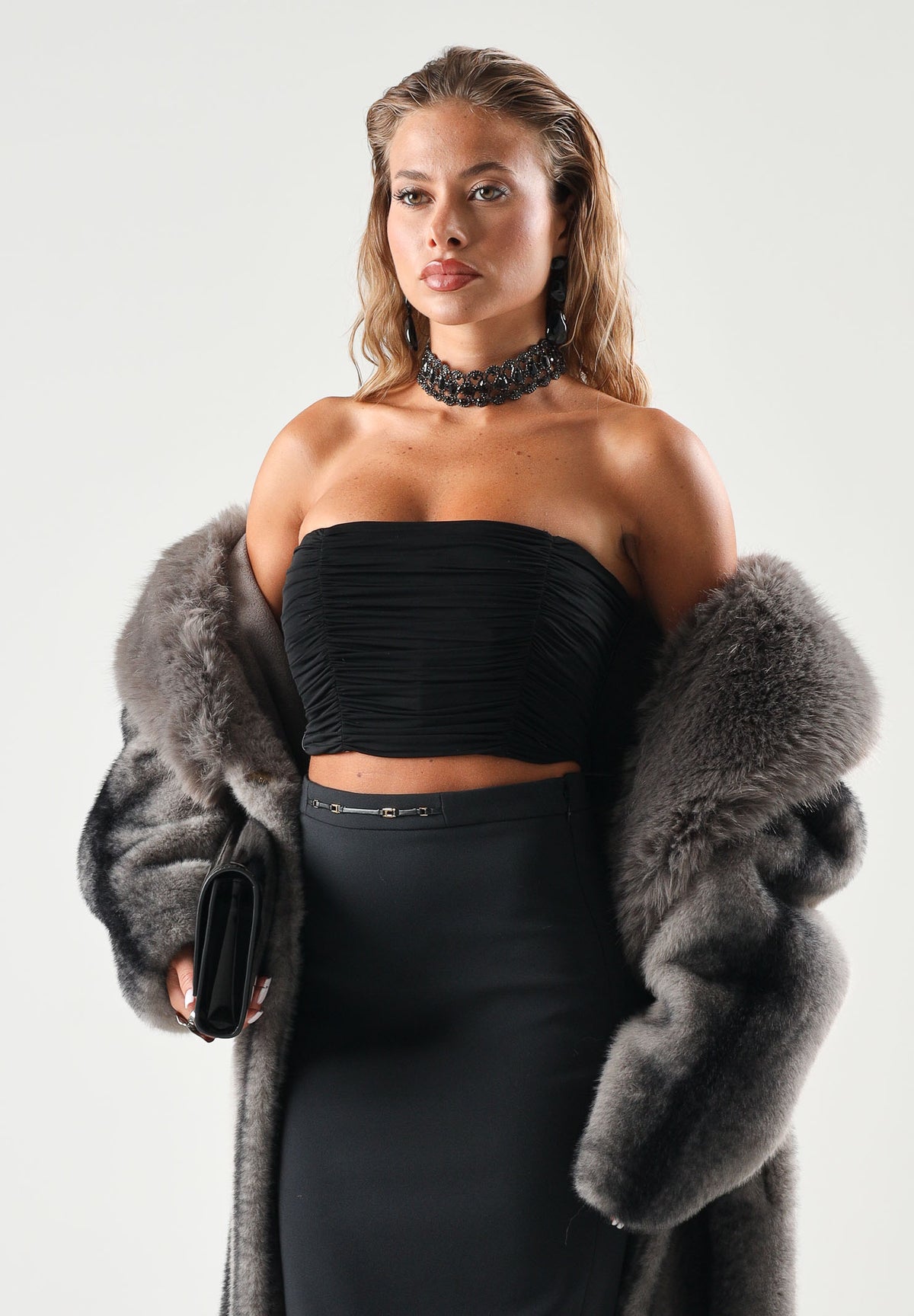 ELISABETTA FRANCHI Corpetto drappeggiato nero per donna con arricciature frontali e laccio al collo. TO09667E2 110 ELISABETTA FRANCHI 