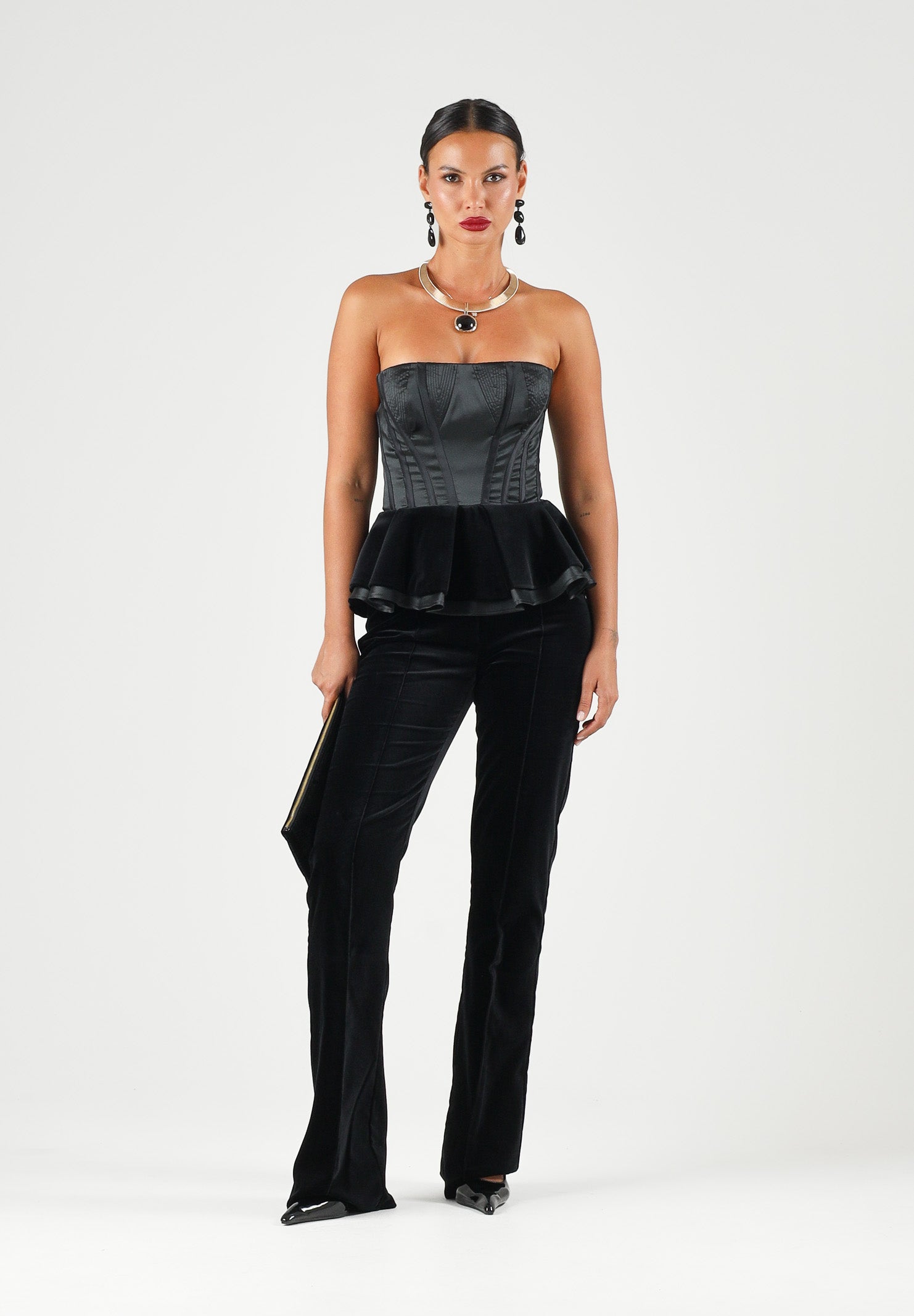 ELISABETTA FRANCHI Tuta nera per donna con elegante corpetto bustier a fascia, dettaglio peplo in vita e pantaloni a zampa. TU06967E2 110 ELISABETTA FRANCHI 