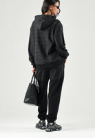 GCDS Felpa con cappuccio HOODIE ALL-OVER MONOGRAM nero per uomo e donna con trama jacquard con monogramma. C2MWQE223F245 999I GCDS 