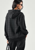 GCDS Felpa con cappuccio HOODIE ALL-OVER MONOGRAM nero per uomo e donna con trama jacquard con monogramma. C2MWQE223F245 999I GCDS 