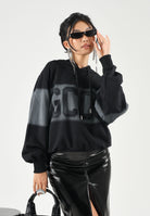 GCDS Felpa con cappuccio nera per uomo e donna con maxi logo frontale C2MWQE233F034 999I GCDS 