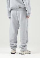 GCDS Pantaloni LOGO SWEATPANTS grigio per uomo e donna con logo ricamato sul fianco e coulisse in vita C2MWQI029F244 932I GCDS 