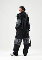 GCDS Pantaloni JOGGER PANTS grigio e nero per uomo e donna con logo iconico C2MWQI231F034 999I GCDS 