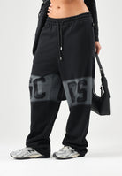 GCDS Pantaloni JOGGER PANTS grigio e nero per uomo e donna con logo iconico C2MWQI231F034 999I GCDS 