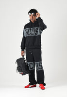GCDS Pantaloni JOGGER PANTS grigio e nero per uomo e donna con logo iconico C2MWQI231F034 999I GCDS 