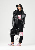 GCDS T-shirt manica corta black-pink-nera e rosa per donna, ragazzi e bambini con banda centrale rosa Z0GJQC585J105 999P GCDS 
