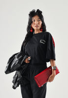 GCDS T-shirt manica corta nera e rossa per uomo e donna con stampa logo a contrasto. Z0MLQC214J080 999R GCDS 