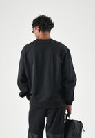 GCDS Felpa girocollo nera da uomo con maxi logo Z0MLQE144F004 999B GCDS 