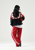 GCDS Felpa con cappuccio HOODIE WITH STRIPES nera per uomo e donna con bande rosse sulle spalle. Z0MLQE213F245 999R GCDS 