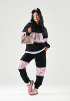 GCDS Pantaloni neri-rosa per uomo e donna con coulisse in vita e logo stampato. Z0MLQI209F004 999P GCDS 