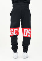 GCDS Pantalone sportivo nero per uomo e donna con banda logo Z0MLQI209F004 999R GCDS 