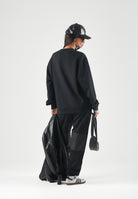 GCDS Pantaloni neri da uomo con maxi logo frontale Z0MLQI211F004 999B GCDS 