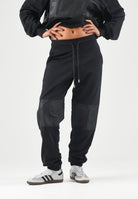 GCDS Pantaloni neri da uomo con maxi logo frontale Z0MLQI211F004 999B GCDS 