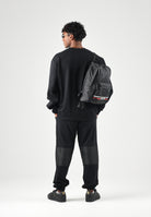 GCDS Pantaloni neri da uomo con maxi logo frontale Z0MLQI211F004 999B GCDS 