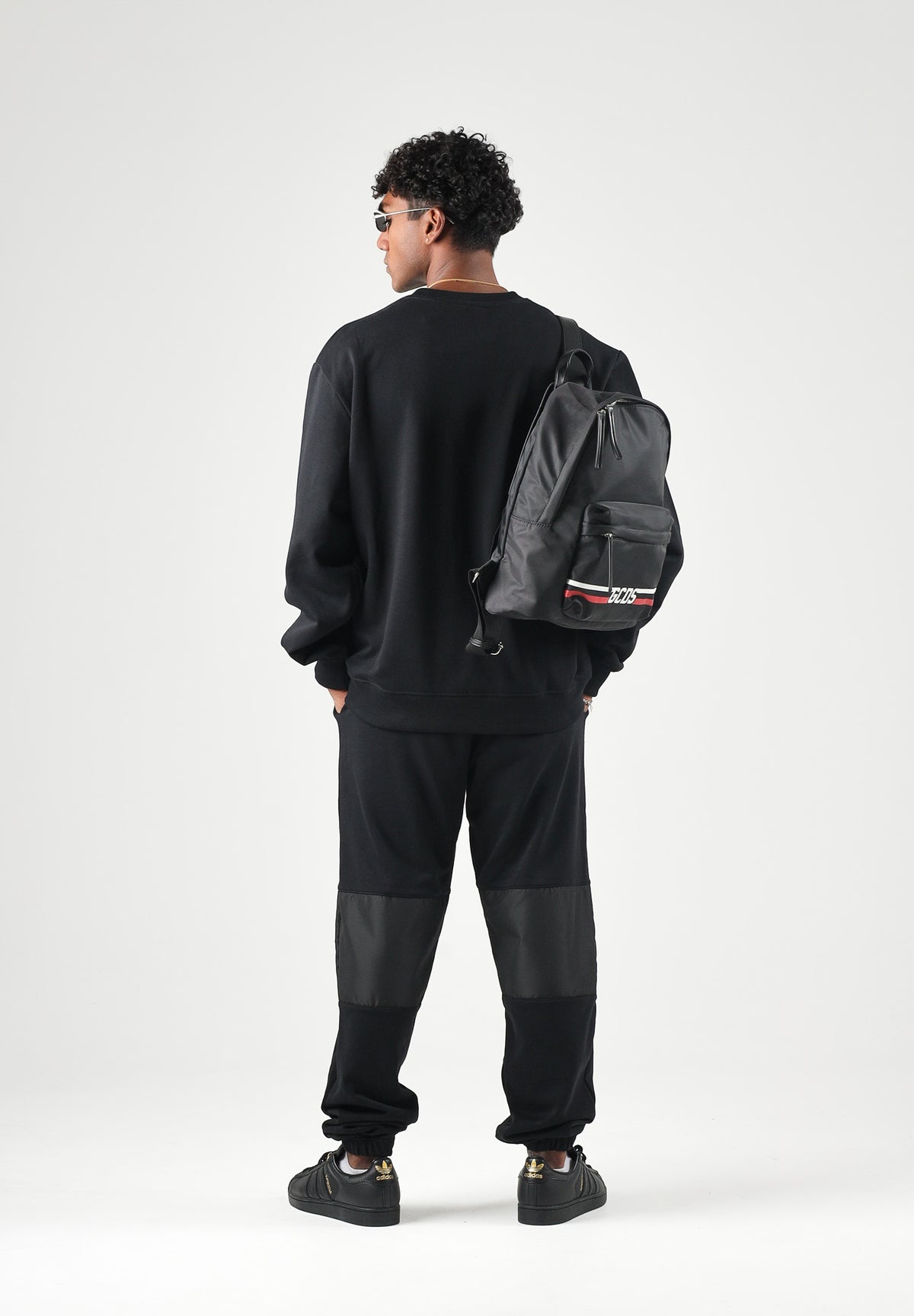 GCDS Pantaloni neri da uomo con maxi logo frontale Z0MLQI211F004 999B GCDS 