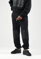 GCDS Pantaloni neri per uomo e donna  con maxi logo frontale Z0MLQI211F004 999B GCDS 