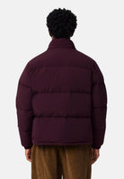 LACOSTE Piumino  bordeaux scuro da uomo, regular fit, imbottito in piuma, con zip frontale e tasche con zip. BH5154 3KE LACOSTE 