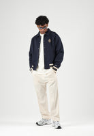 LACOSTE Bomber WOOL BLEND  blu da uomo con colletto camicia, bottoni automatici e dettagli a righe BH8614 MXQ LACOSTE 