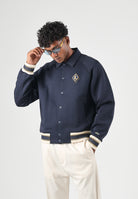 LACOSTE Bomber WOOL BLEND  blu da uomo con colletto camicia, bottoni automatici e dettagli a righe BH8614 MXQ LACOSTE 