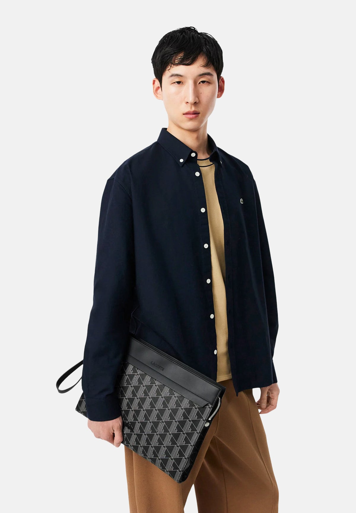 LACOSTE Pochette THE BLEND MONOGRAM nera da uomo con stampa monogram all-over NH5065 H45 LACOSTE 