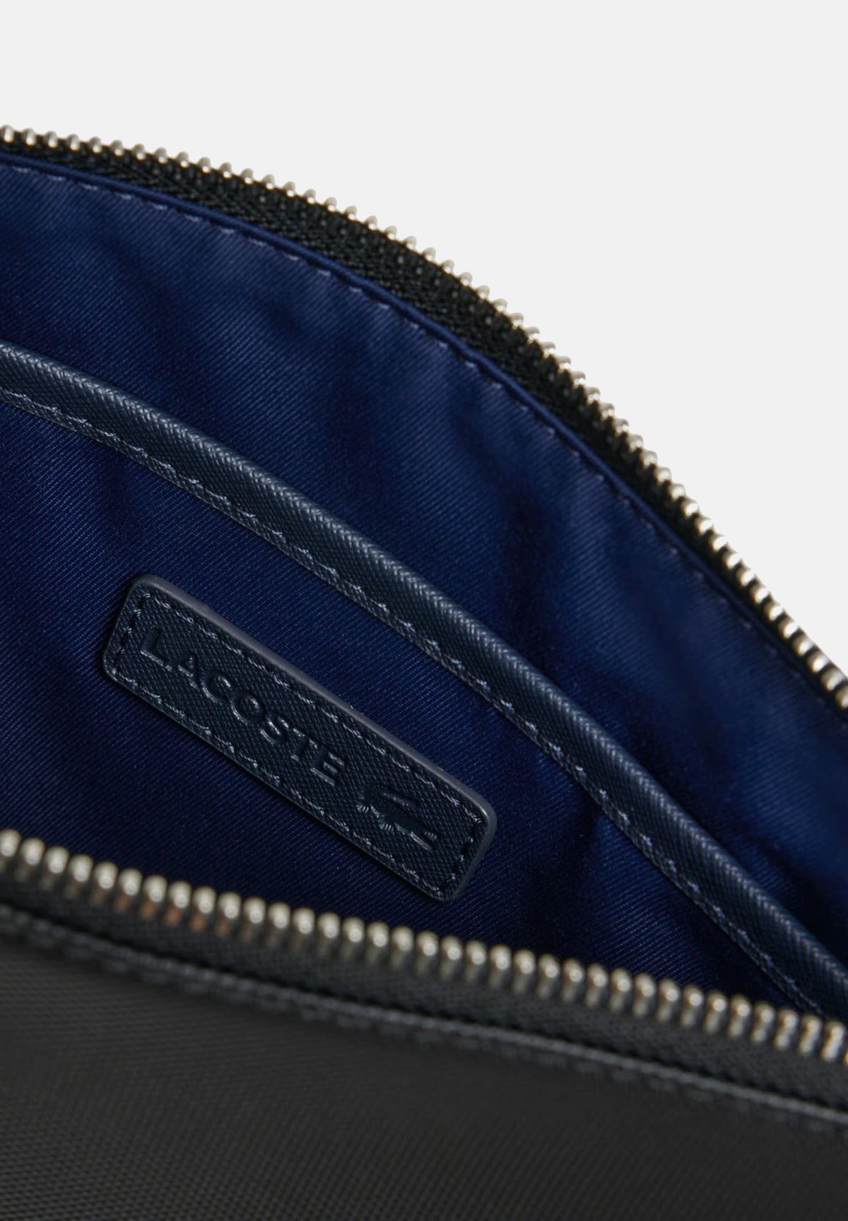 LACOSTE Pochette THE BLEND POUCH nera da uomo con chiusura a zip, cinturino da polso NH5082 000 LACOSTE 