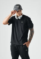 LACOSTE T-shirt manica corta nera per uomo e donna con iconico coccodrillo ricamato sul petto. TH0876 031 LACOSTE 