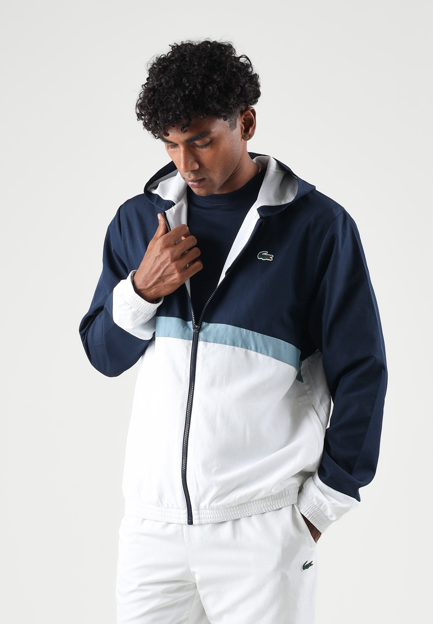 LACOSTE Tuta HOODED TRACKSUIT bianca per uomo con pantalone coordinato bicolore. WH6604 ZC5 LACOSTE 