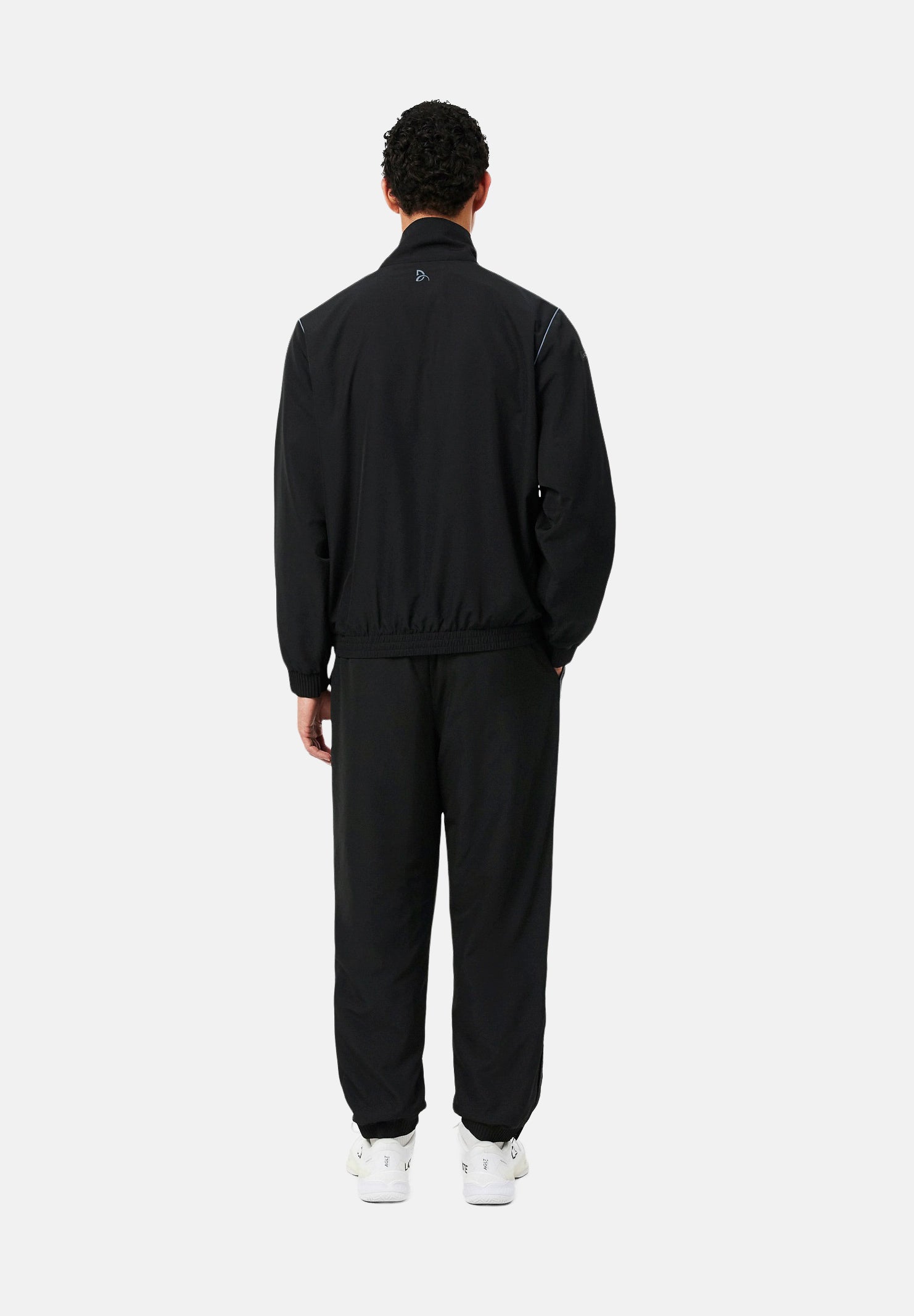 LACOSTE Tuta SOLID TRACKSUIT nera per uomo in tessuto tecnico con mini logo iconico WH6790 ZDQ LACOSTE 