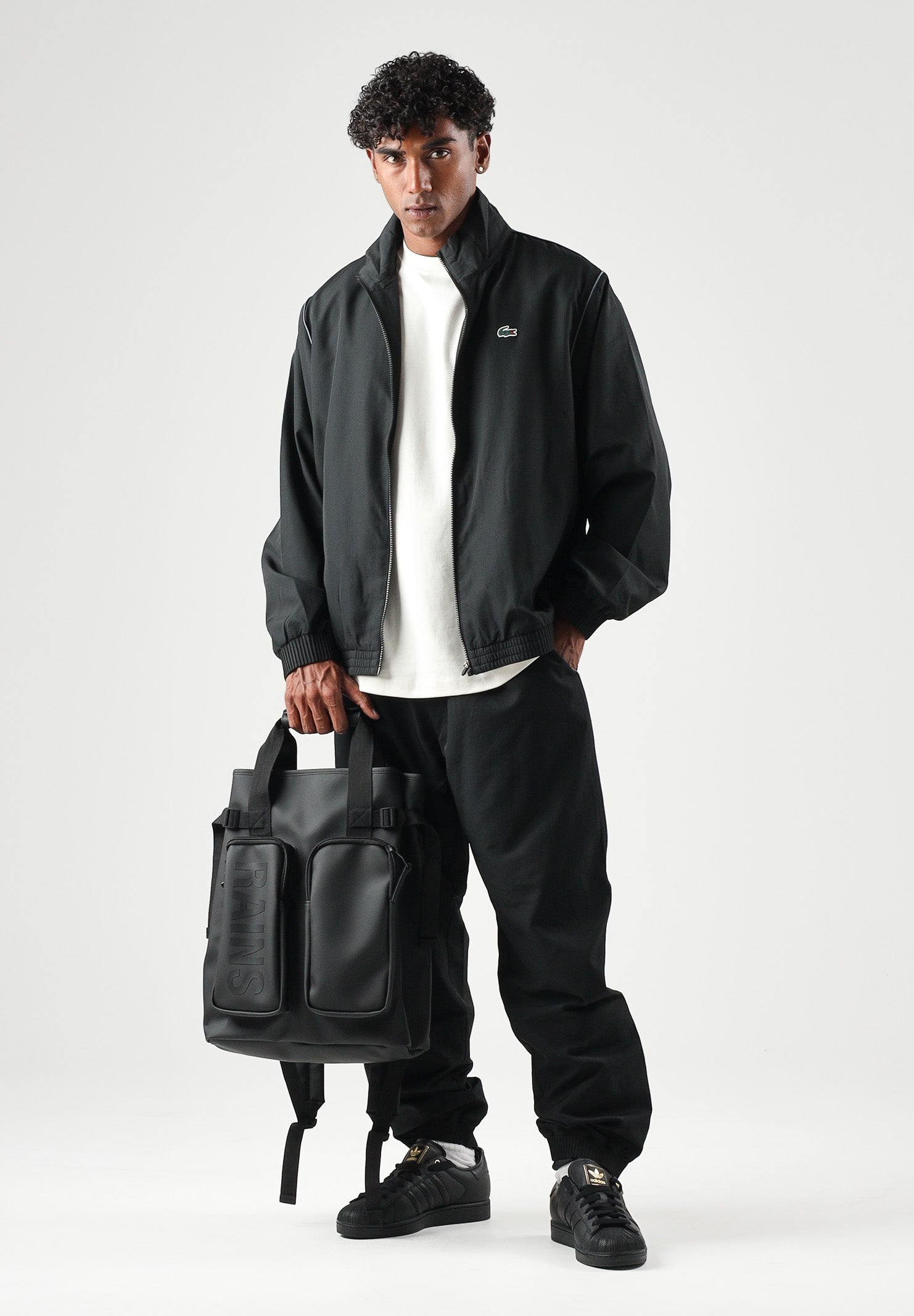 LACOSTE Tuta SOLID TRACKSUIT nera per uomo in tessuto tecnico con mini logo iconico WH6790 ZDQ LACOSTE 