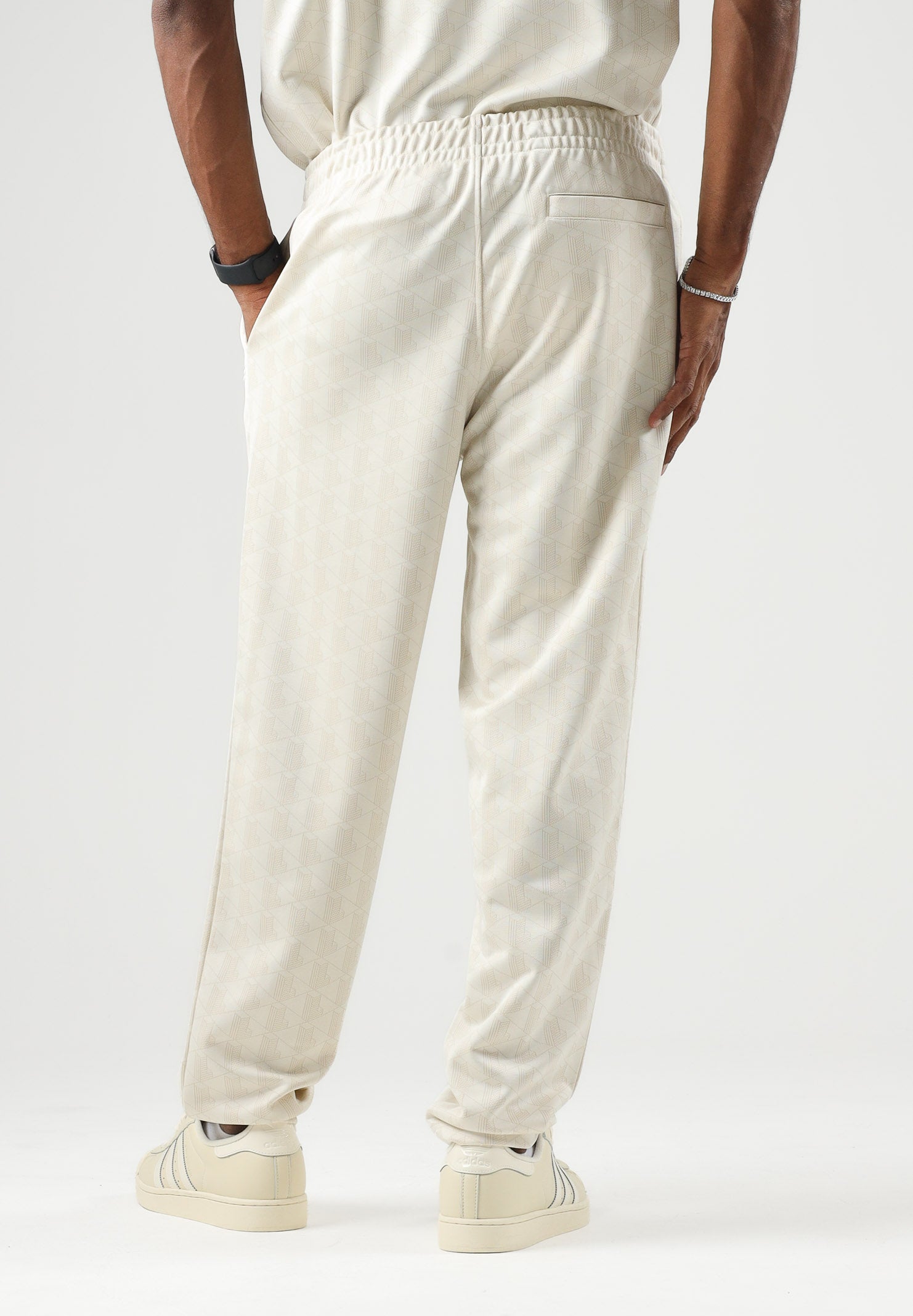 LACOSTE Pantaloni CASUAL TROUSERS panna per uomo con elastico in vita e tasche a filetto. XH0197 8LX LACOSTE 