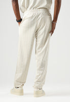 LACOSTE Pantaloni CASUAL TROUSERS panna per uomo con elastico in vita e tasche a filetto. XH0197 8LX LACOSTE 