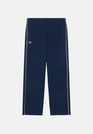 LACOSTE Pantaloni TRACK PANTS WITH PIPING blu per uomo con profili a contrasto lungo le gambe XH6932 HHW LACOSTE 
