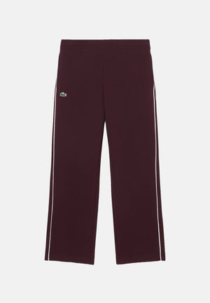 LACOSTE Pantaloni TRACK PANTS WITH PIPING bordeaux  per uomo con profili a contrasto lungo le gambe XH6932 ZB5 LACOSTE 