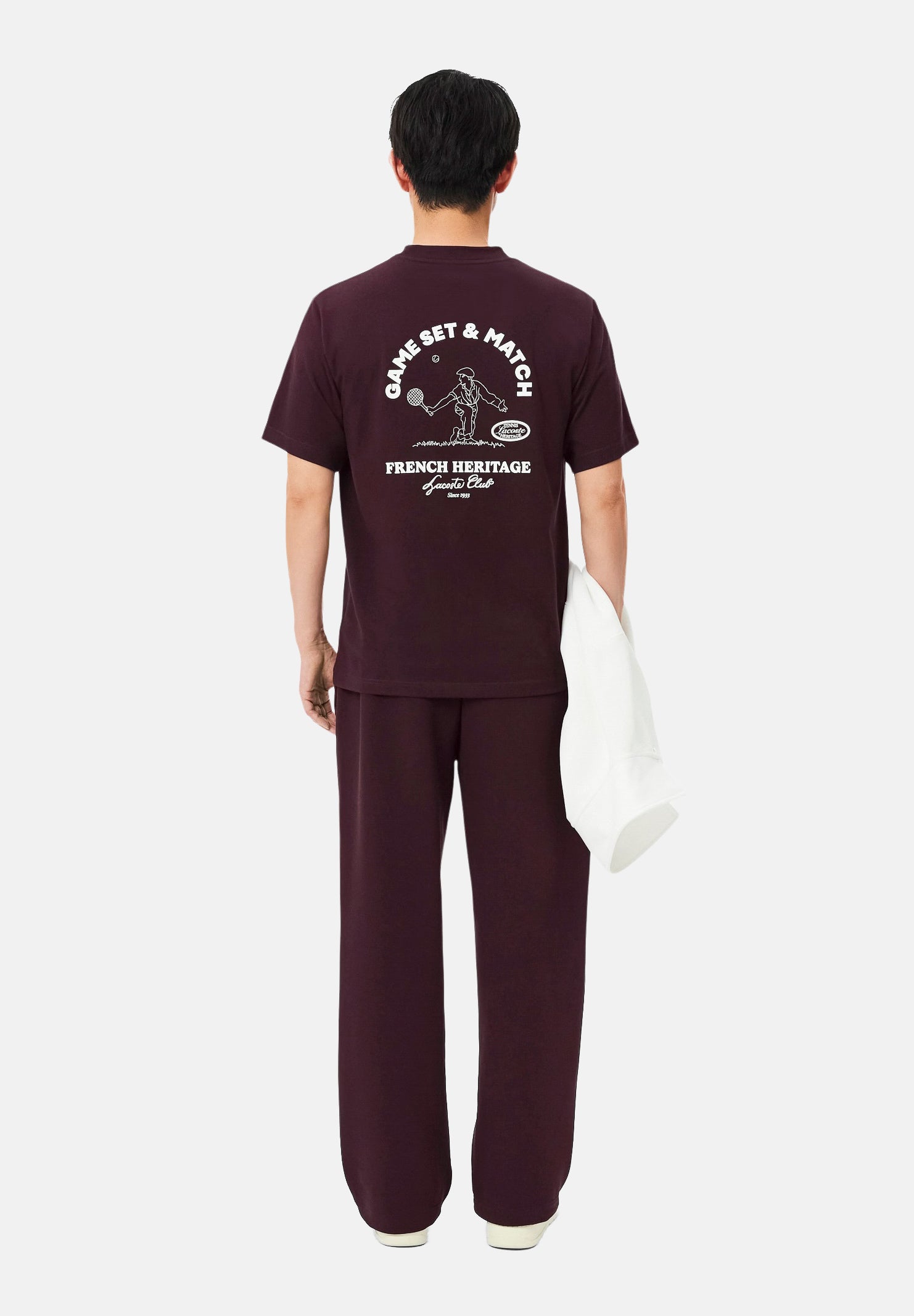 LACOSTE Pantaloni TRACK PANTS WITH PIPING bordeaux  per uomo con profili a contrasto lungo le gambe XH6932 ZB5 LACOSTE 