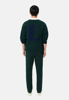 LACOSTE Pantaloni PIPED TRACK PANTS verde per uomo con bande laterali e coulisse in vita. XH8615 YZP LACOSTE 
