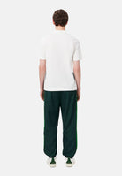 LACOSTE Pantaloni ELASTICATED CUFF verde per uomo con polsini elasticizzati alle caviglie. XH8706 TE2 LACOSTE 
