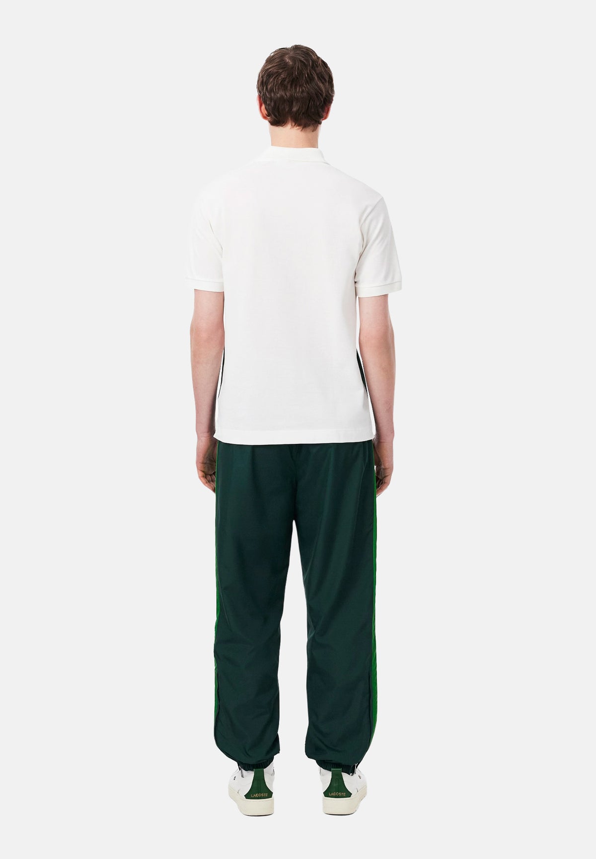 LACOSTE Pantaloni ELASTICATED CUFF verde per uomo con polsini elasticizzati alle caviglie. XH8706 TE2 LACOSTE 