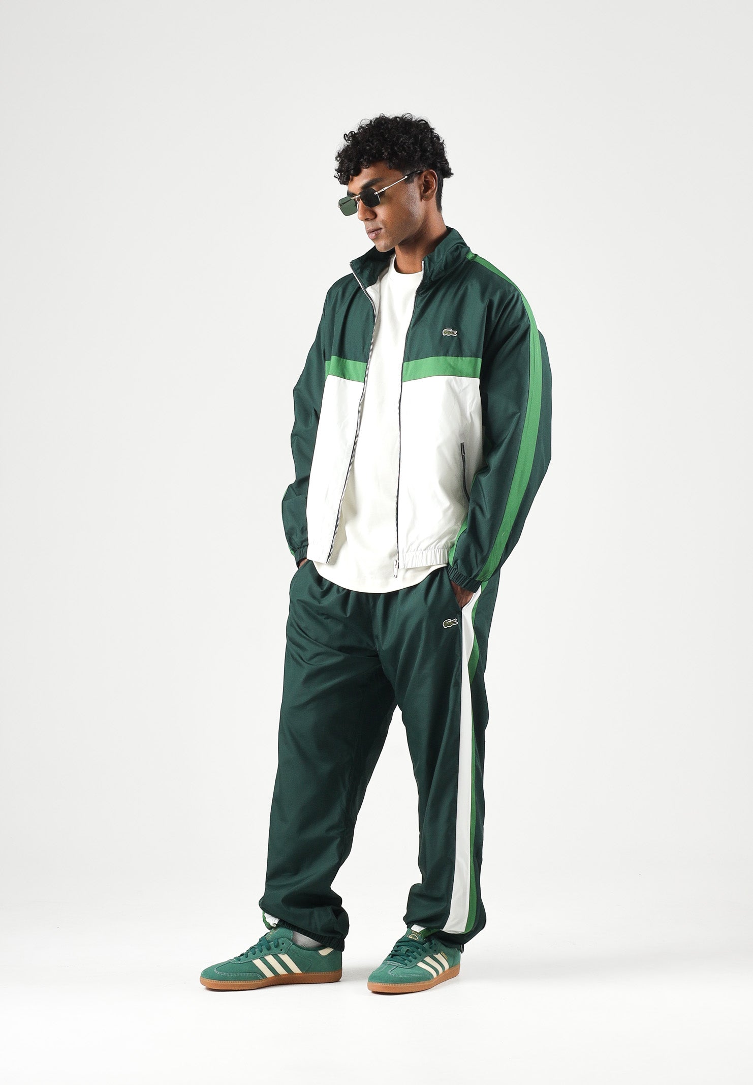 LACOSTE Pantaloni ELASTICATED CUFF verde per uomo con polsini elasticizzati alle caviglie. XH8706 TE2 LACOSTE 