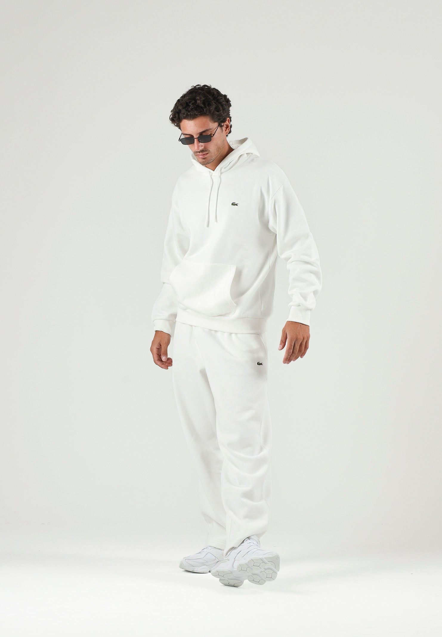 LACOSTE Pantaloni bianchi sportivi per uomo e donna con coccodrillo ricamato XH8867 70V LACOSTE 