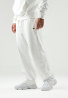 LACOSTE Pantaloni bianchi sportivi per uomo e donna con coccodrillo ricamato XH8867 70V LACOSTE 