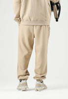 LACOSTE Pantaloni FLEECE SWEATPANTS beige per uomo con coulisse e polsini elasticizzati alle caviglie. XH9455 02S LACOSTE 